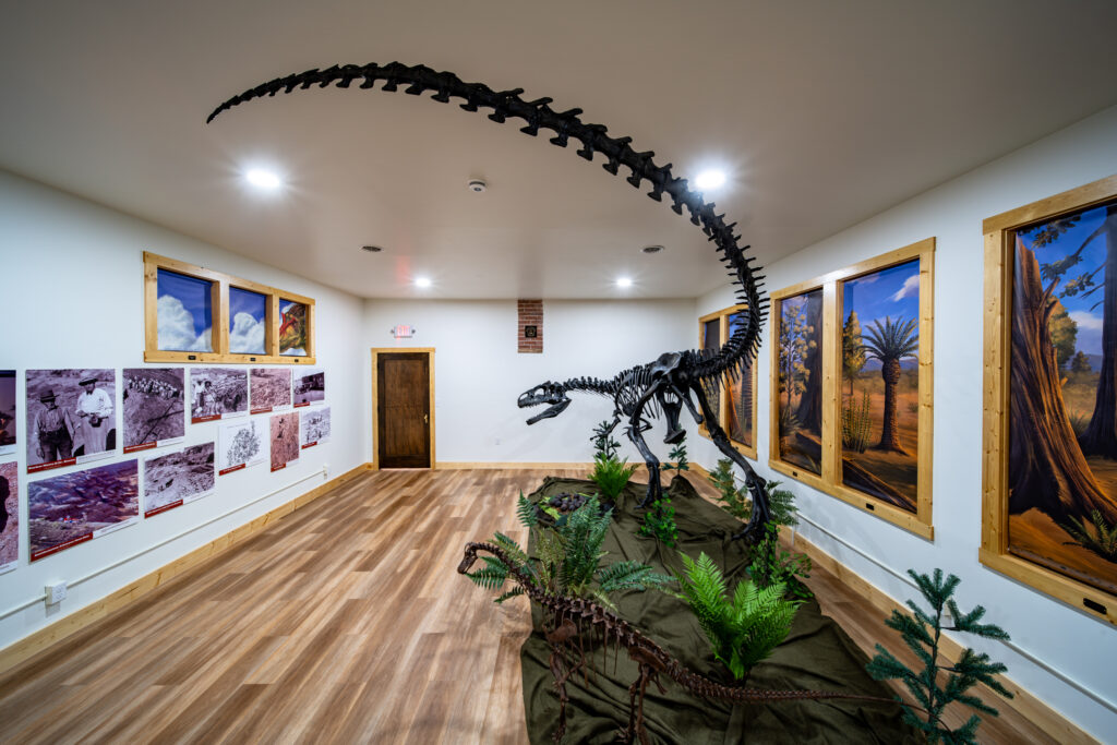 Full Allosaurus skeleton with Jurassic murals in the Wild West Dino Den museum